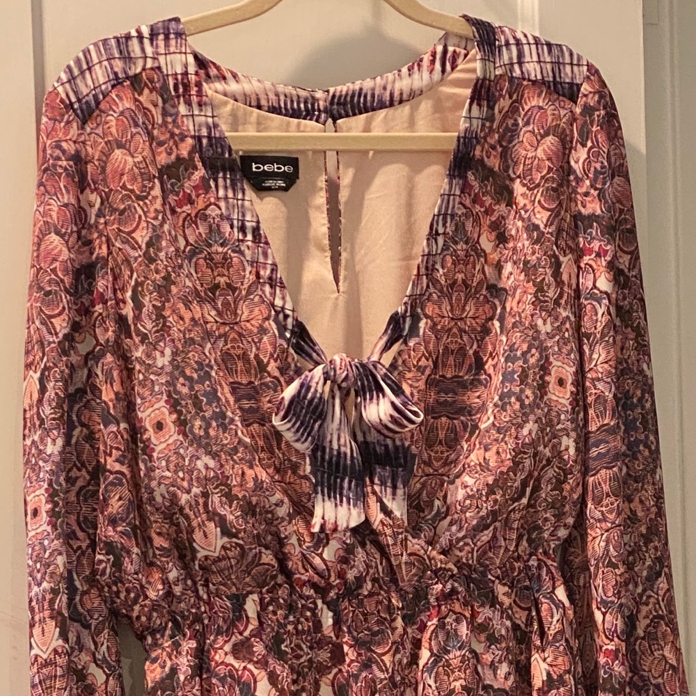 Bebe Romper, new - no tags. Size Medium.